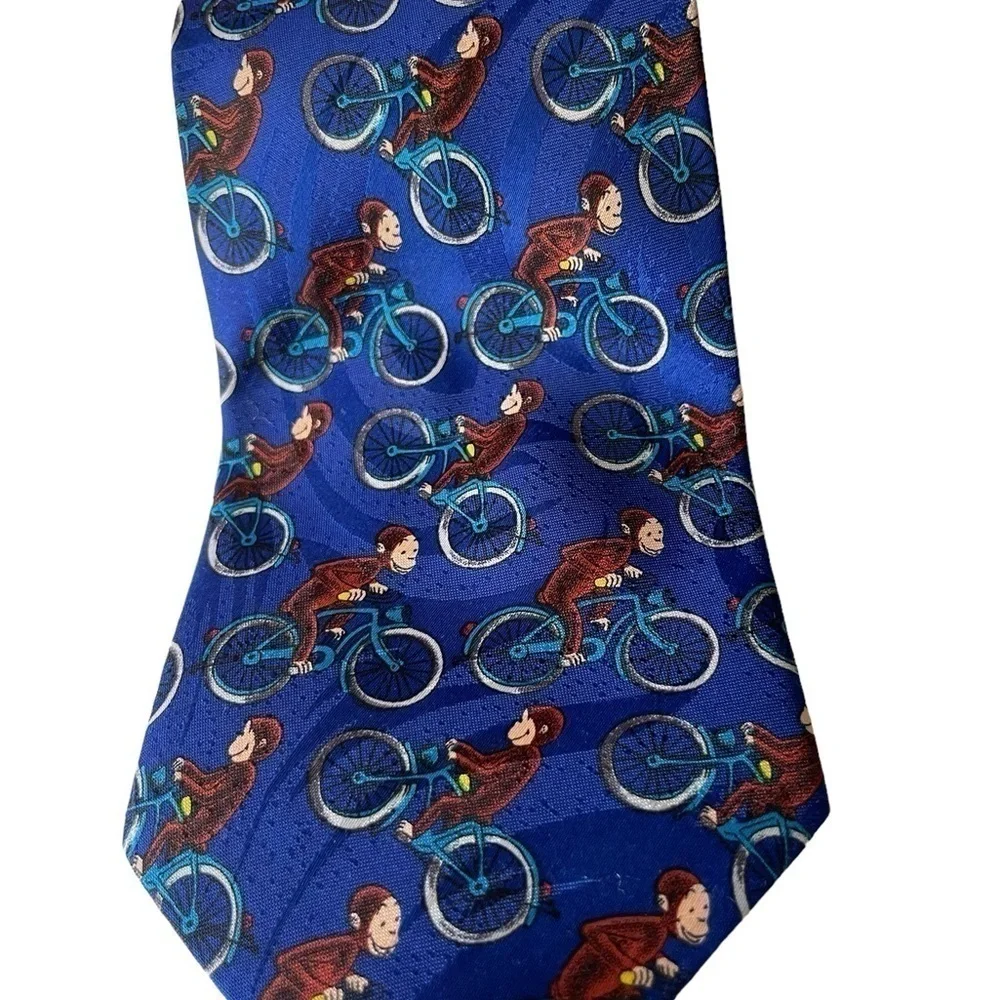 Curious George men’s tie 100% Polyester George on a bicycle Novelty Tie blue